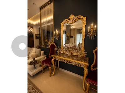 console and mirror and 2 chairs