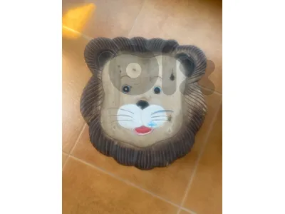 Wooden lion shaped stool