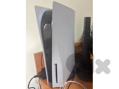 ps5 with 2 controllers .