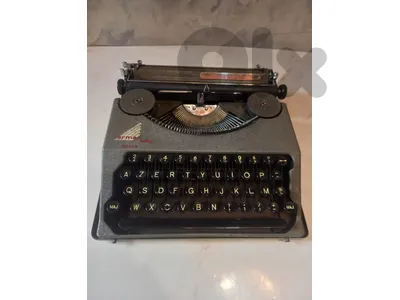 vintage Hermes Baby portable typewriter