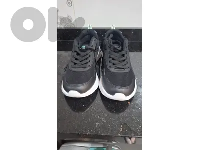 Kinetix sports shoes