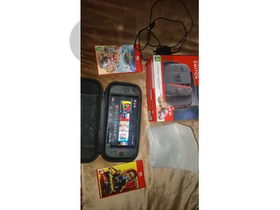 Nintendo switch 2 like new used for 2 mounth with online sub and 2 gam