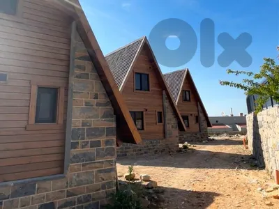 L21500 Land with 3 Chalets in Prime Location For Sale In Zaarour