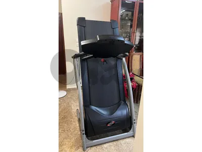 treadmill with gym accessories