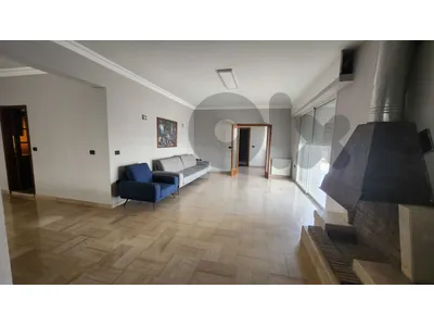 Semi furnished rooftop with terrace & open view in Achrafieh for rent