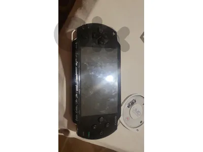 psp with 7 games and charger( need  battery)