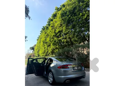 Jaguar XF V6 Portfolio 2011 خارقة من زوائد
