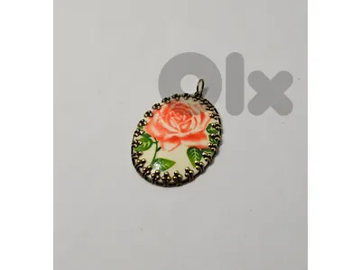 old ceramic rose pendant 7$