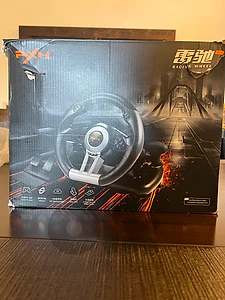 steering wheel with peddals and holder