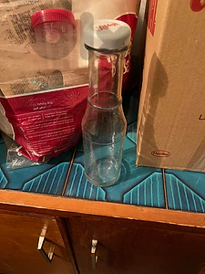 Empty glass jars and bottles