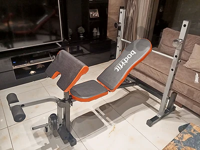 bench press adjustable, and dumbells and axes