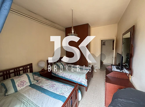 L21579 Spacious Apartment in Prime Location For Sale in Dekweneh