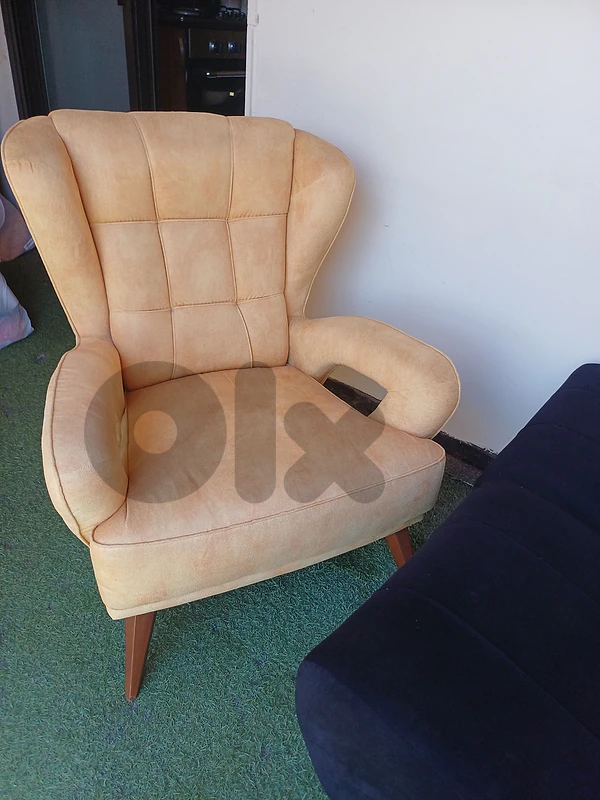 2 Mustard armchairs - 1 black sofa bed