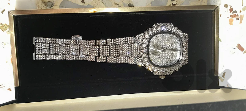 Diamond-encrusted watch similar to Patek Philippe
