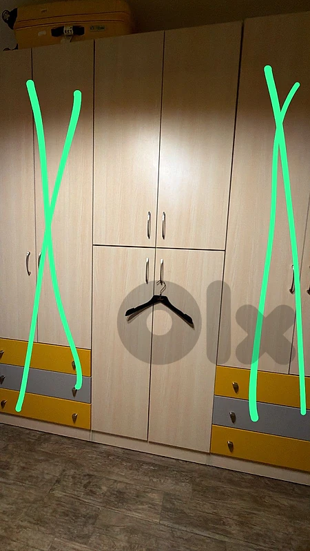 bed , closet, wall cabinets