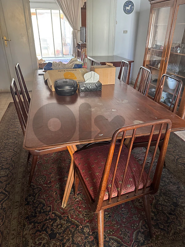 table, dressoir, and chairs