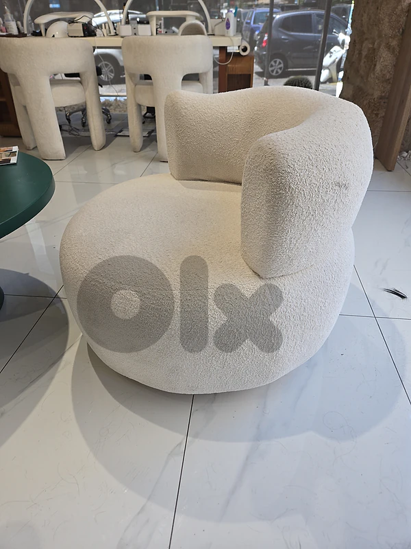 Bouclé Swivel & Sculptural Accent Chairs