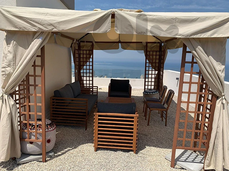 Stylish Apartment with Private Rooftop & Stunning Sea View for Rent.