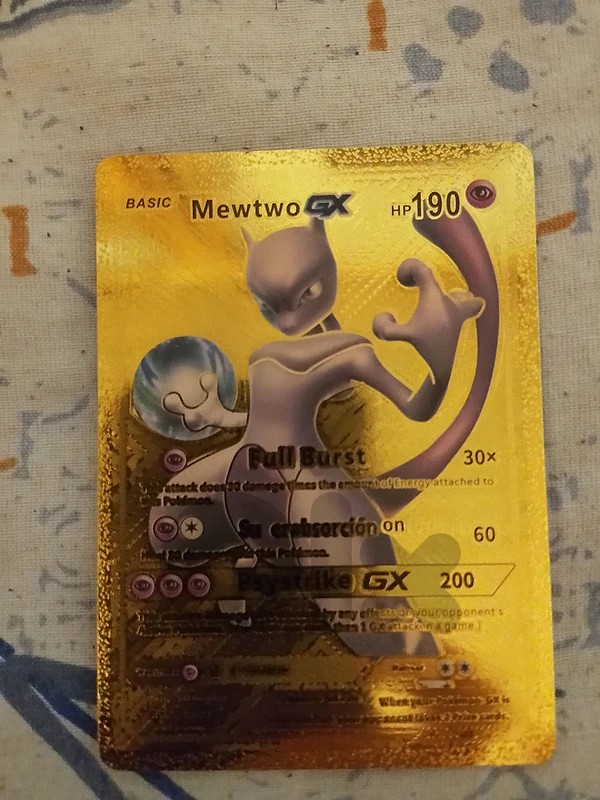 Mewtwo pokemon golden card.