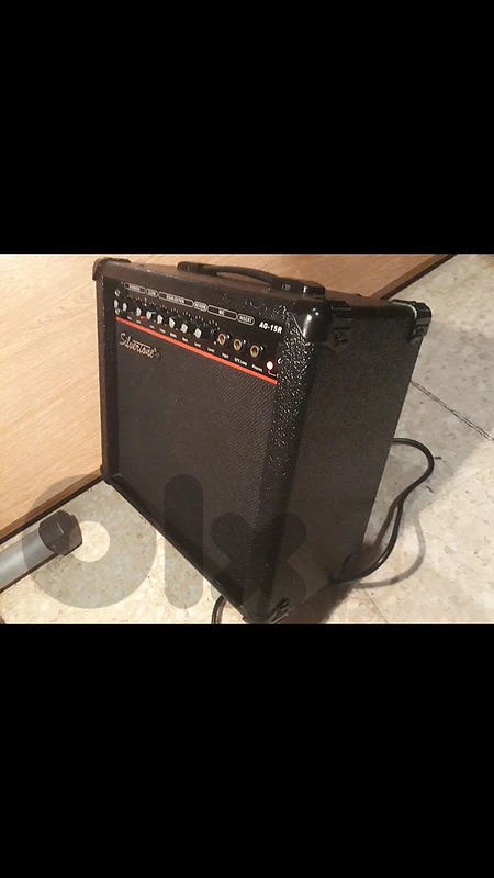 SILVERTONE (AG-15R) solid state guitar combo amplifier 30WATTS Peak 8 inches speaker an incredible clear sounding guitar amp. for its size with effects reverb , overdrive & equalizer the amp still new