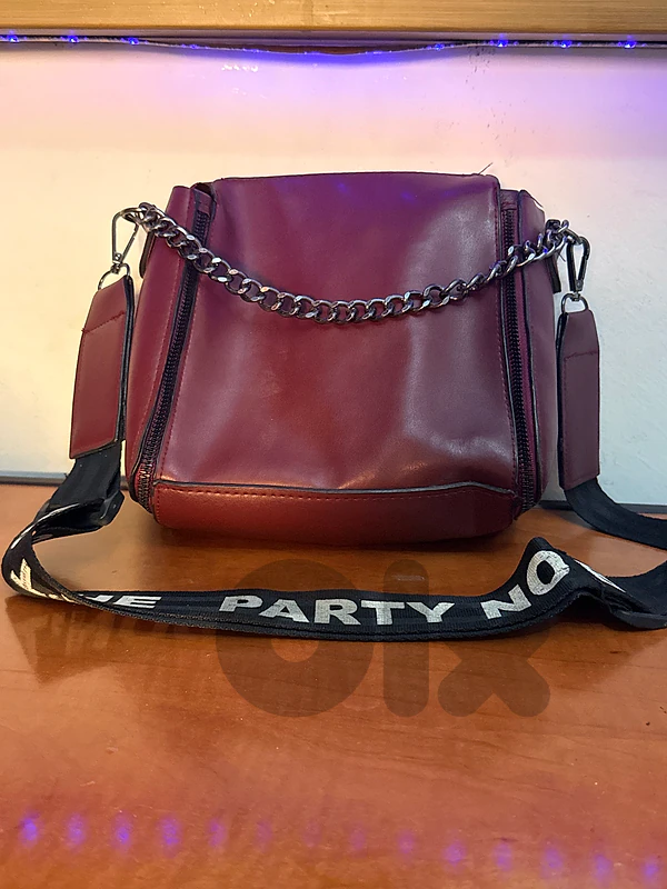 dark burgundy handbag