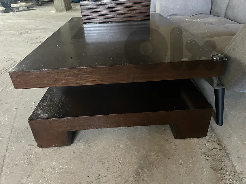 used wood table with 2 drawers and 2 sofa beds
