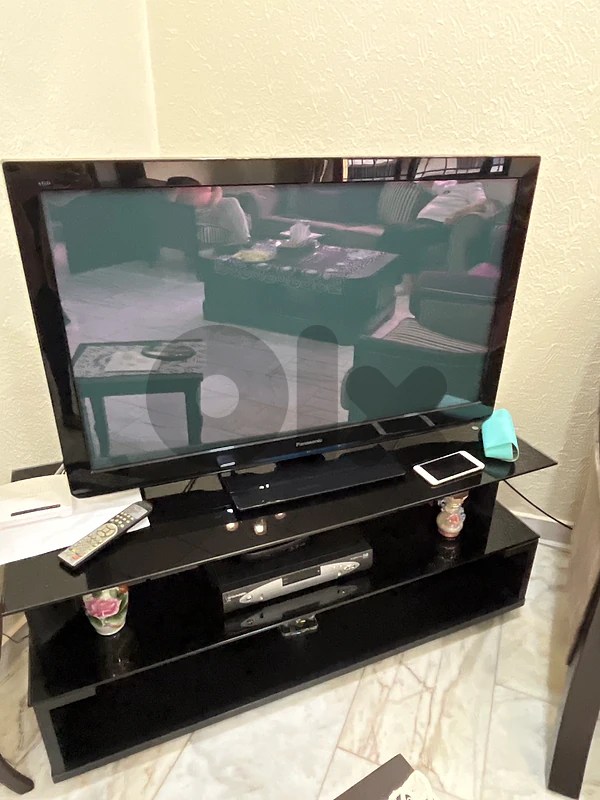 TV and stand and small TV