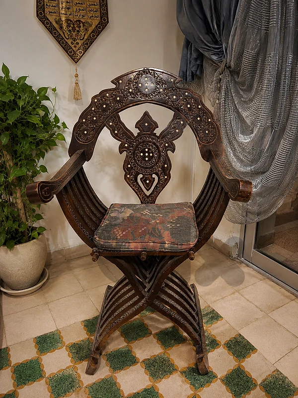 Antique handcrafted wooden chair with genuine mother-of-pearl inlay