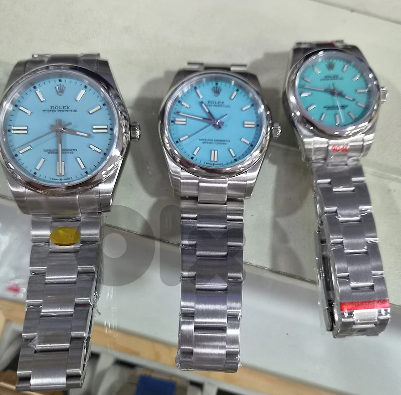 ROLEX Oyster Perpetual Turquoise Blue Dial