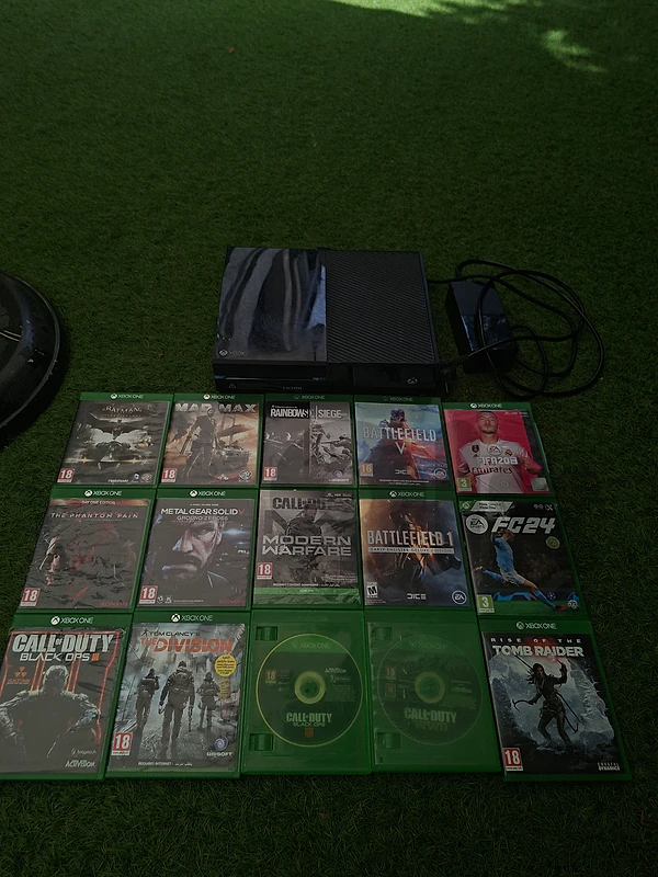 Used Xbox one console+games,check the description for further info