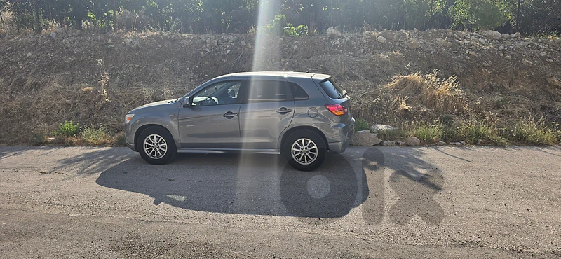 Mitsubishi Outlander Sport 2011 ES 2WD 4dr ميكانيك top