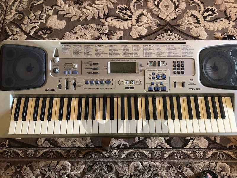 Casio CTK-591 Electronic Keyboard Piano (61 Keys)