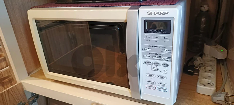 microwave sharp brand used as new