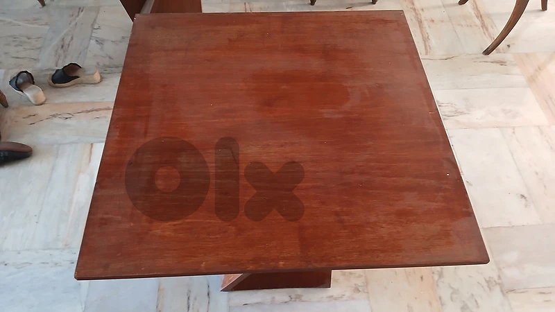 Table with opening mechanism