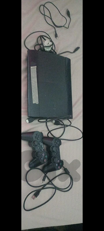 ps3 with 2 controls and cables
