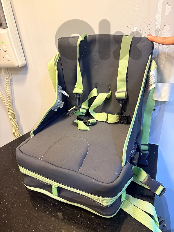 a compact, travel-friendly booster seat