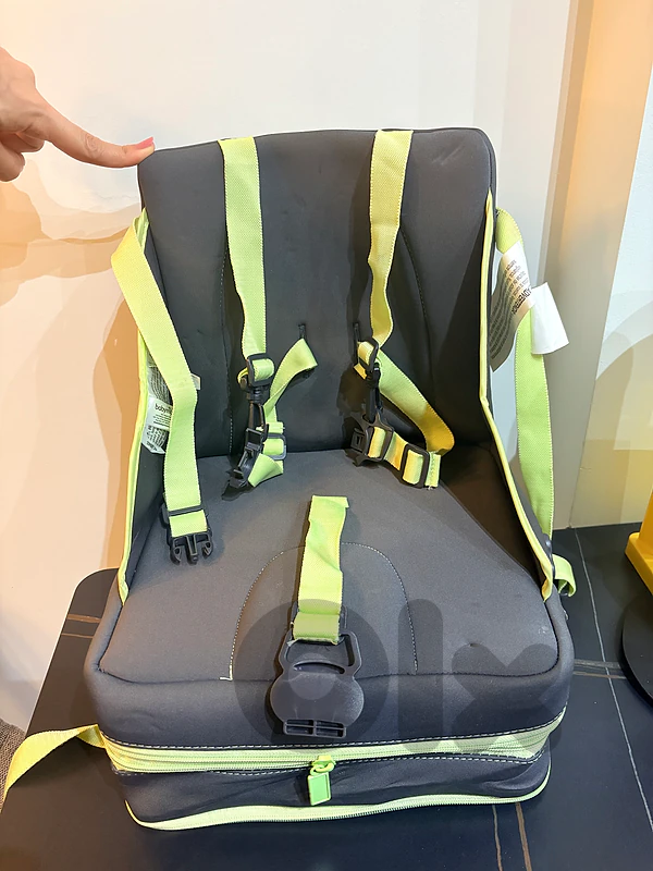 a compact, travel-friendly booster seat