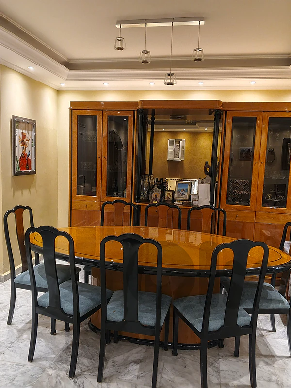 dining table with chairs and dressoire
