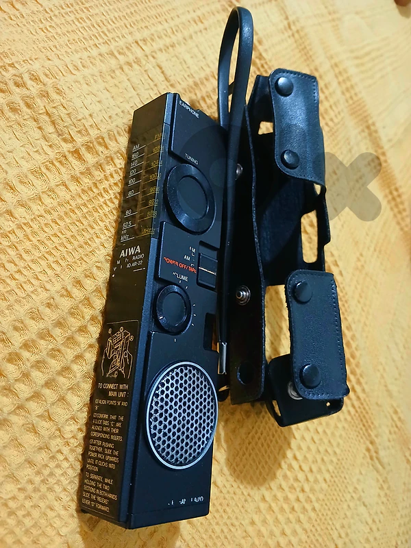 Vintage mini radio with leather box from Aiwa
راديو قديم جداً مع بيت