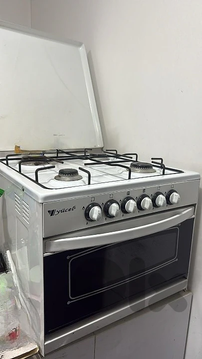 small oven and cooktop on gas very clean