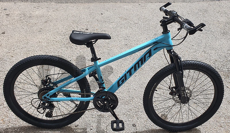 Gitma 24"  disc brakes vitesse 21 speed (brqnd new)