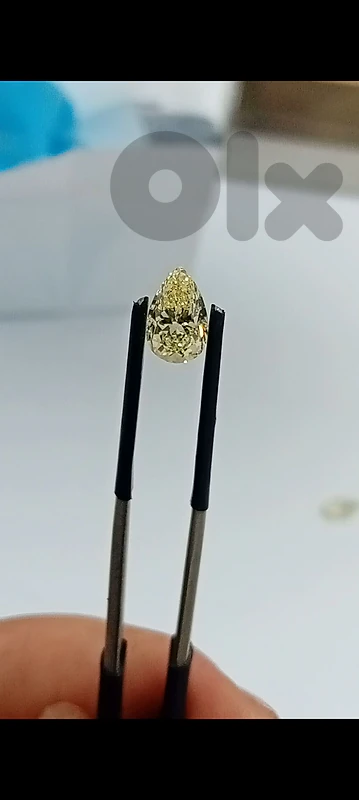 natural diamond light yellow 2.01 ct. vs2 clarity
