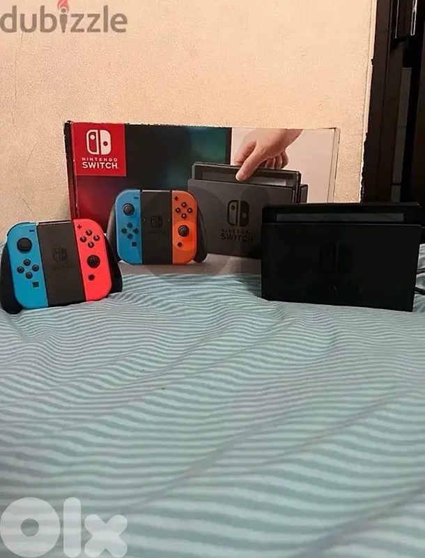 Nintendo Switch Very good condition + Super Mario game