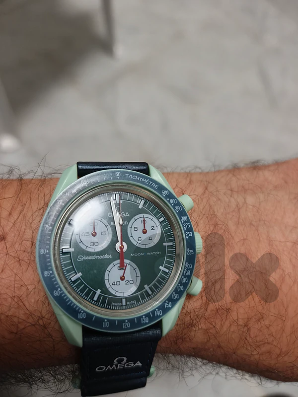 swatch omega mission to earth