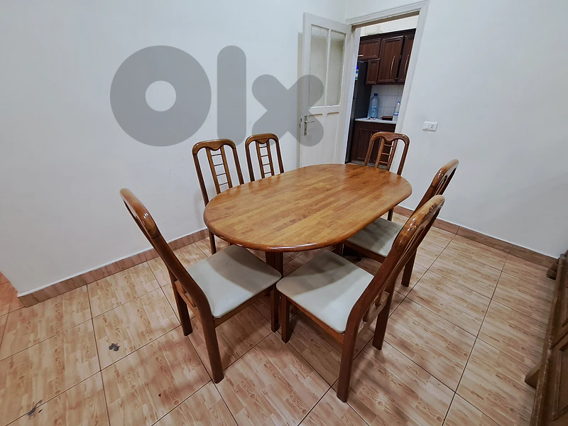 Dining table, 6 chairs and cupboard with mirror