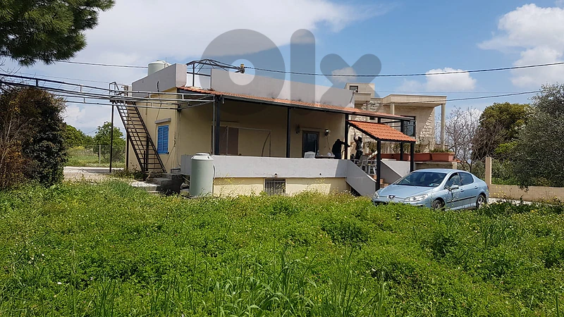small standalone house with a terrace