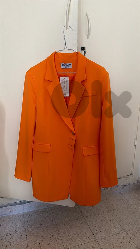 woman orange blazer
