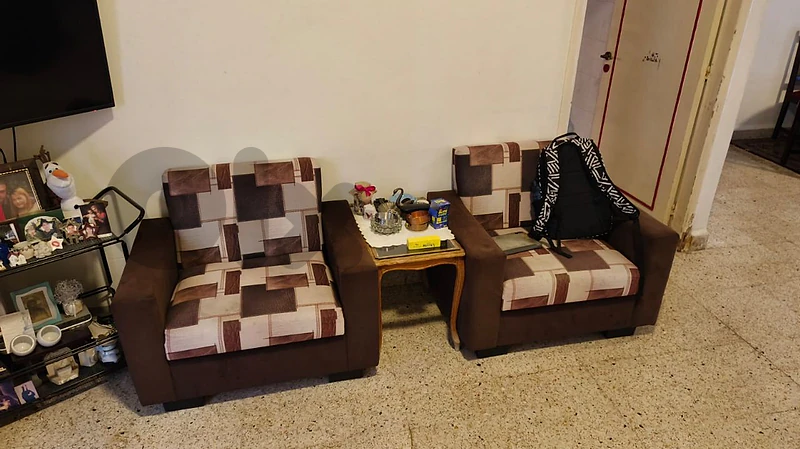 Living Room, Bed, Chairs, Gas Stove