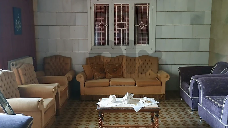 Two full set sofas for a sitting room