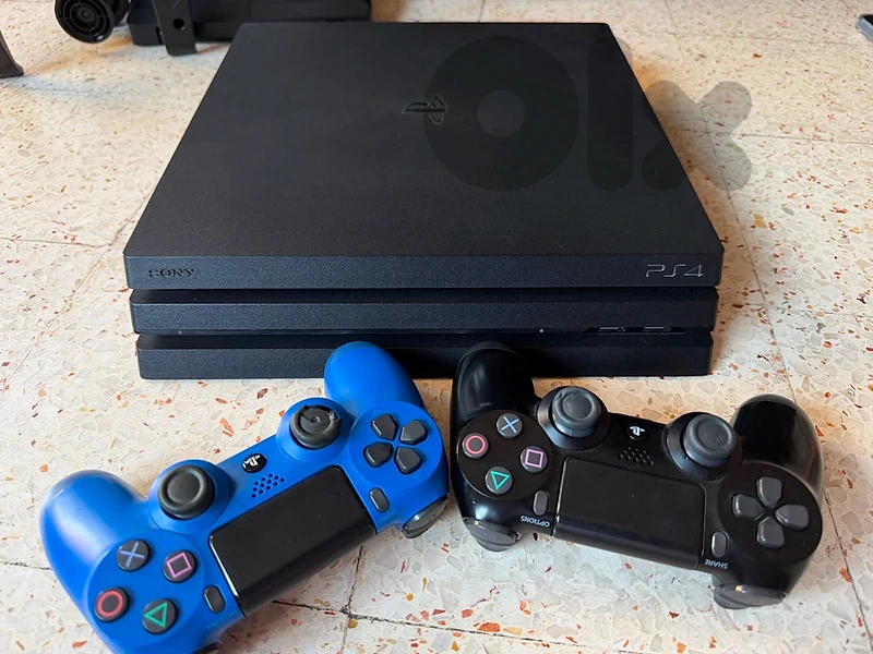 ps4 pro with 2 controllers w 8 games